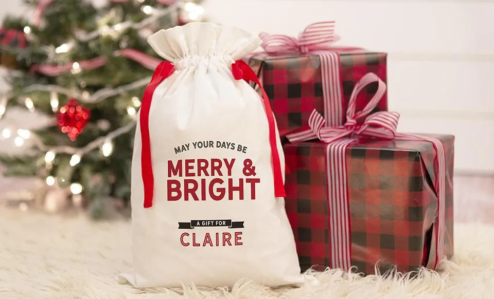 Personalized Red Ribbon Santa Gift Bags – Santa’s Workshop Collection